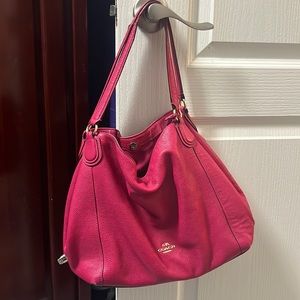 coach new york purse!! pink and so cuteee just am not getting use out of it.